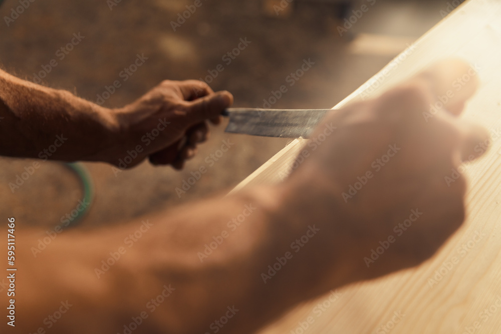 Skilled frawknife artisan's precision and control Skilled frawknife artisan's precision and control