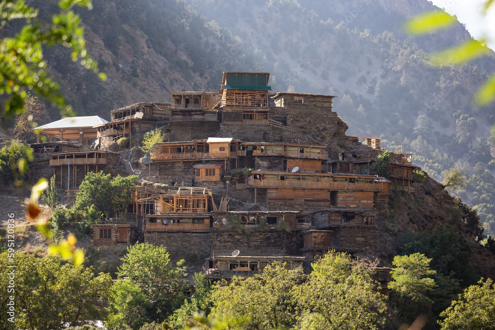 Traditional Kalash wooden houses in Kalash valley in Pakistan