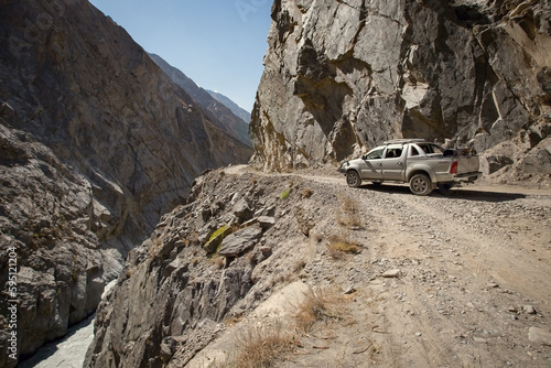 Dangerous road to Nanga Parbat base camp travelling by off road car Pakistan photo