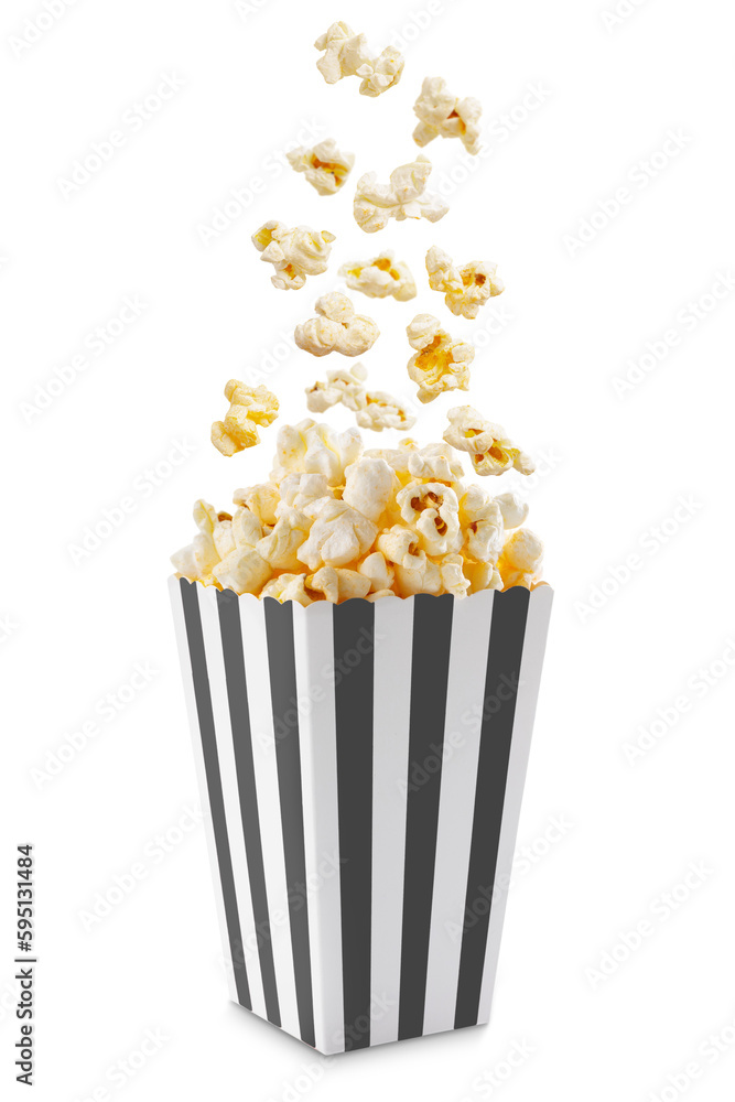 Popcorn flying out of black white striped paper box isolated on white, transparent background, PNG, with copy space. Splash, levitation of popcorn grains. Popcorn flying out of black white striped paper box isolated on white, transparent background, PNG, with copy space. Splash, levitation of popcorn grains.