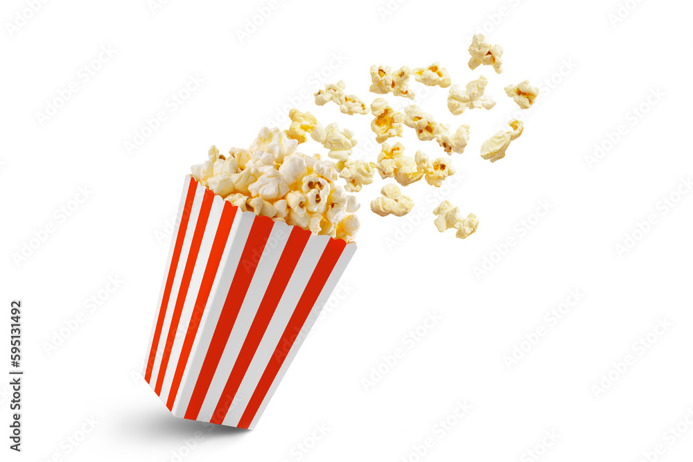 Popcorn flying out of red white striped paper box isolated on white, transparent background, PNG, with copy space. Splash, levitation of popcorn grains. - obrazy, fototapety, plakaty 