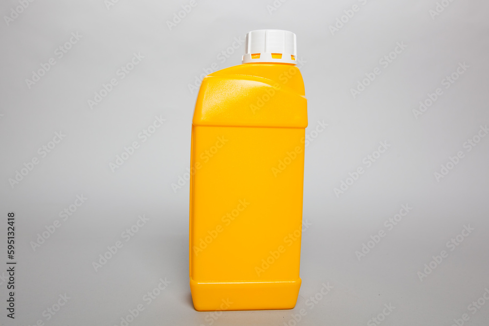 Yellow plastic canister with white lid Yellow plastic canister with white lid