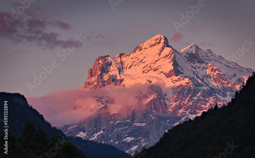 Maettenberg Peak in Gündlischwand, Bern, radiates a warm glow during sunset