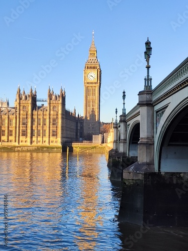 Portrait of Mr. Big Ben and its reflection on river Thames. London  UK