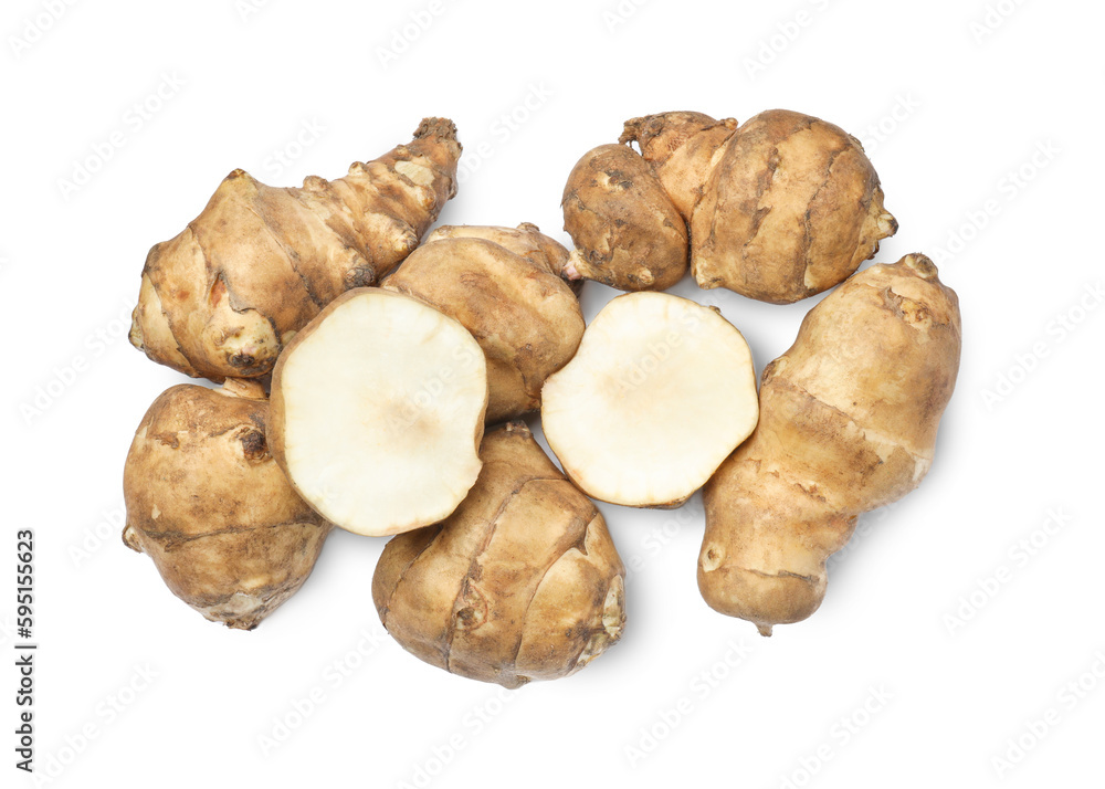 Whole and cut Jerusalem artichokes isolated on white, top view Whole and cut Jerusalem artichokes isolated on white, top view