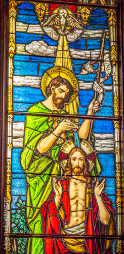 Baptism of Jesus Christ stained glass, Trinity Parish Church, Saint Augustine, Florida. Founded in the 1700's. Stained glass from mid-1800's