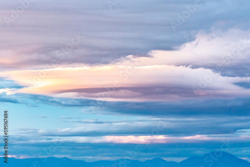 USA, New Mexico, White Sands National Monument. Sunset cloud patterns. © Danita Delimont