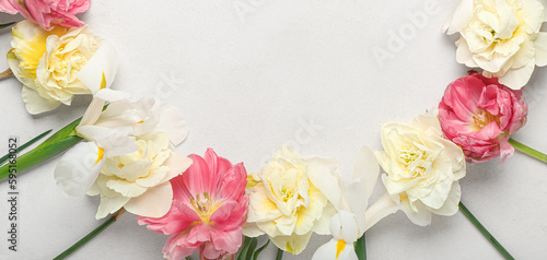 Beautiful spring flowers on light background. Banner for design