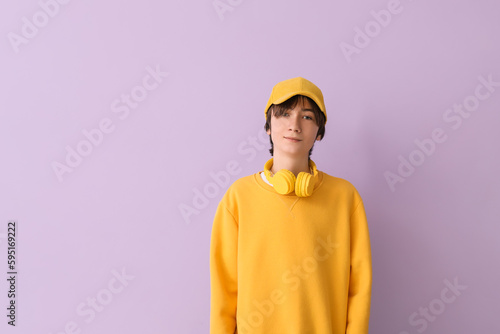 Teenage boy in cap with hea...