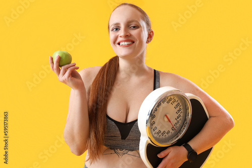 Young overweight woman with...