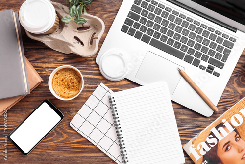 Cups of coffee with laptop,...