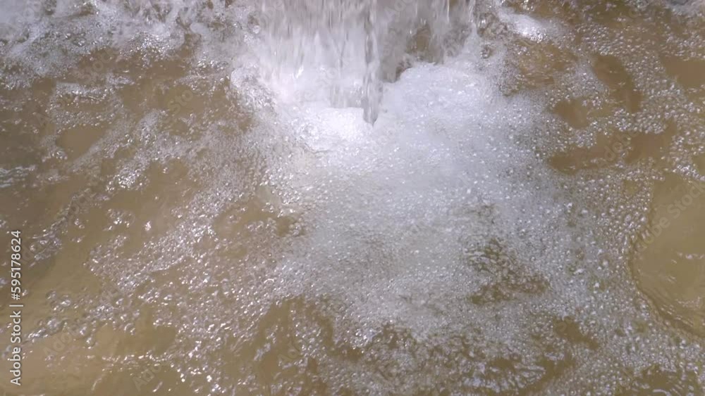 Slow motion of a waterfall in nature. Slow motion of a waterfall in nature.