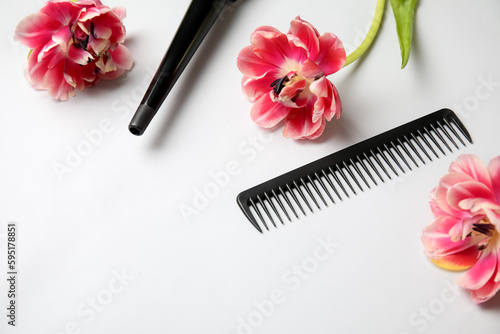 Hair styling tools and pink...
