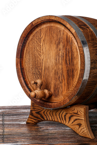 Wooden barrel on table against white background, closeup