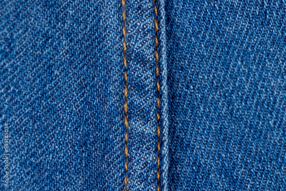 details of a blue denim fabric made of natural cotton details of a blue denim fabric made of natural cotton