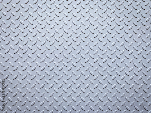 Metal floor plate with diamond pattern.