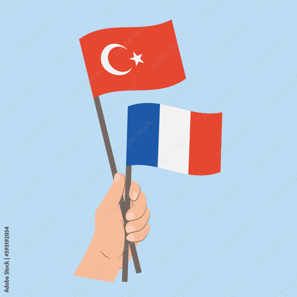 Flags of Turkey and France, Hand Holding flags Flags of Turkey and France, Hand Holding flags