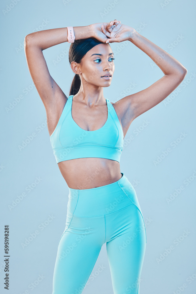 Health, fitness and thinking with a sports woman in studio on a gray background for a wellness workout. Exercise, gym and idea with an attractive young female athlete training for a healthy lifestyle