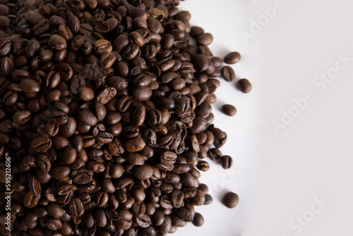 Roasted coffee beans closeup texture background copy space