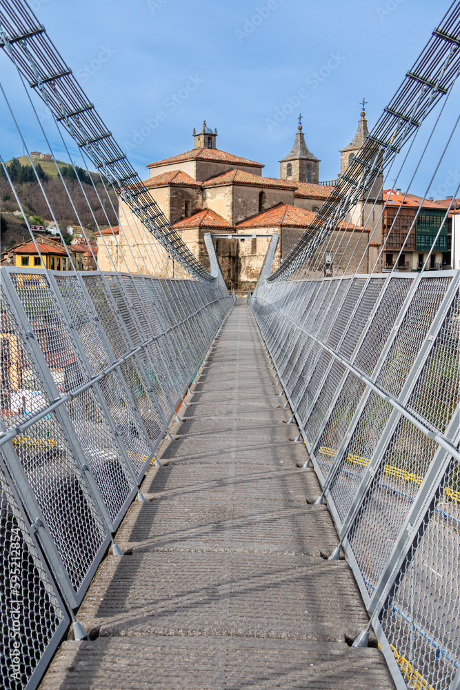 Obraz premium Suspension bridge, for the passage of people, and cross the Narcea river in Cangas del Narcea, Asturias, Spain