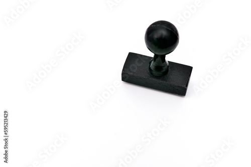 Black wooden rubber stamp with the copy space on the white paper