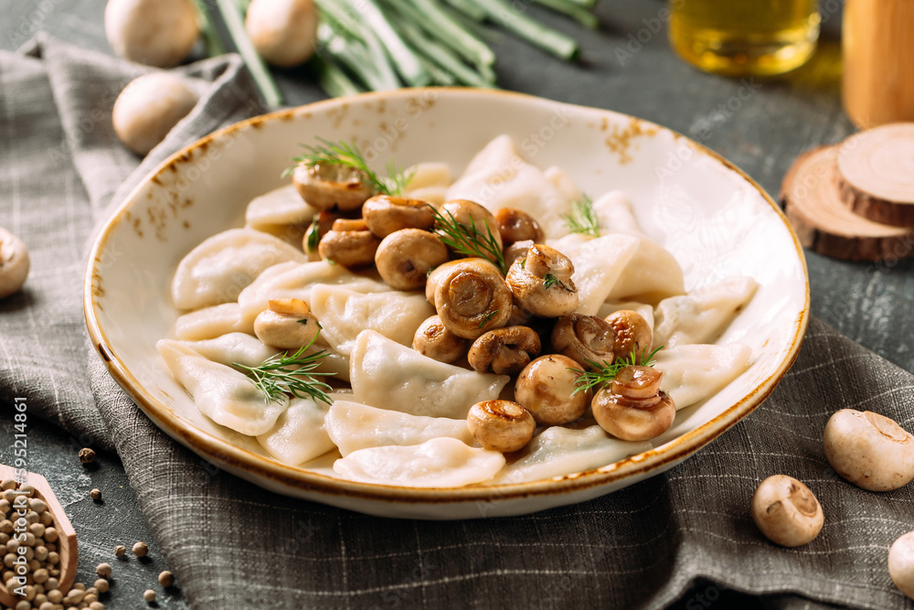 Portion of russian dumplings vareniki with mushroom filling Portion of russian dumplings vareniki with mushroom filling