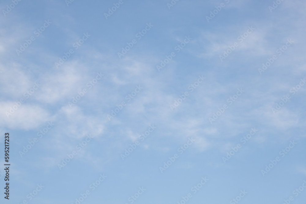 Blue sky with white clouds, background.