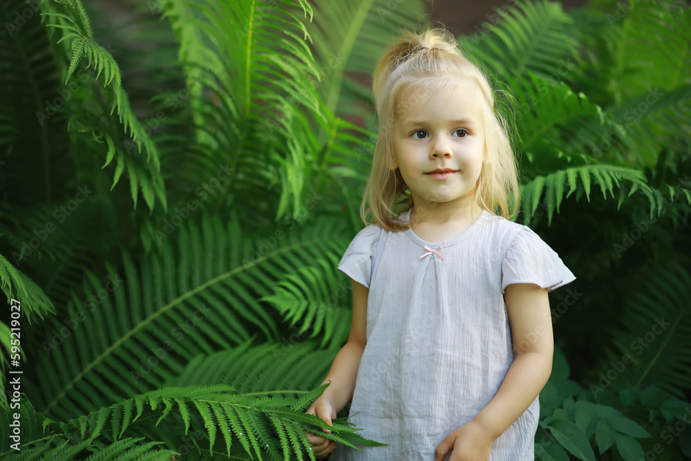 Children walk in the summer in nature. Child on a sunny spring morning in the park. Traveling with children. Children walk in the summer in nature. Child on a sunny spring morning in the park. Traveling with children.