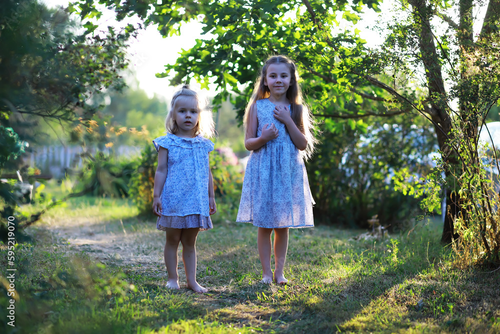 Children walk in the summer in nature. Child on a sunny spring morning in the park. Traveling with children. Children walk in the summer in nature. Child on a sunny spring morning in the park. Traveling with children.