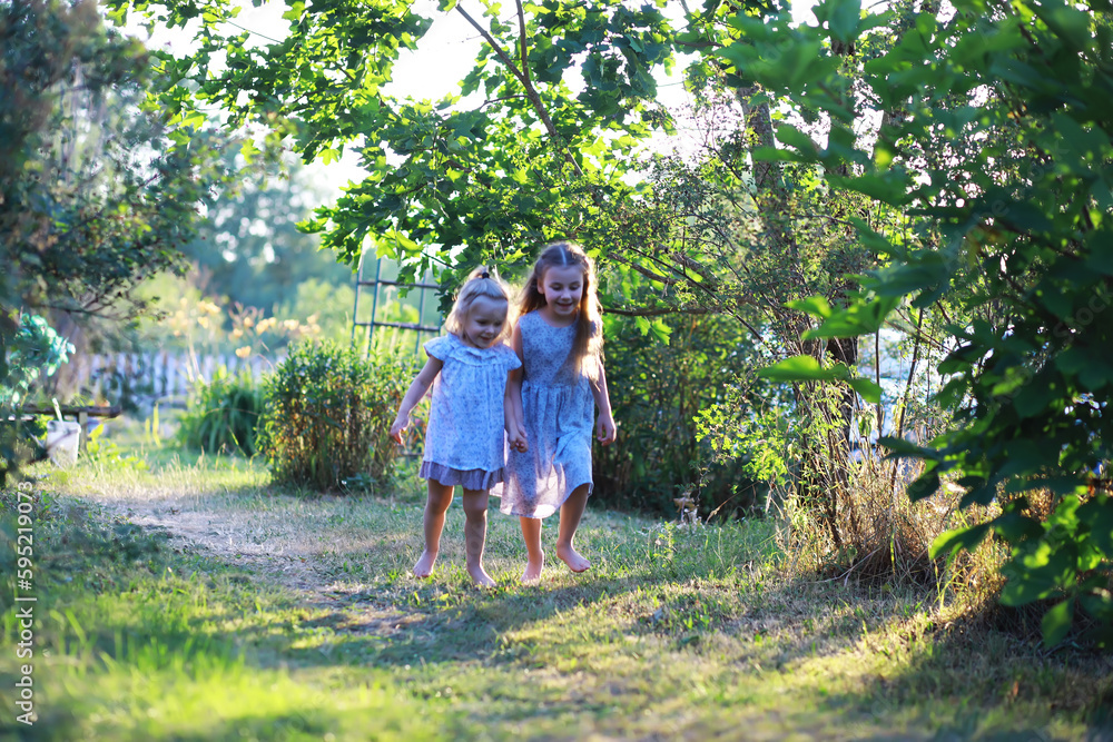 Children walk in the summer in nature. Child on a sunny spring morning in the park. Traveling with children. Children walk in the summer in nature. Child on a sunny spring morning in the park. Traveling with children.