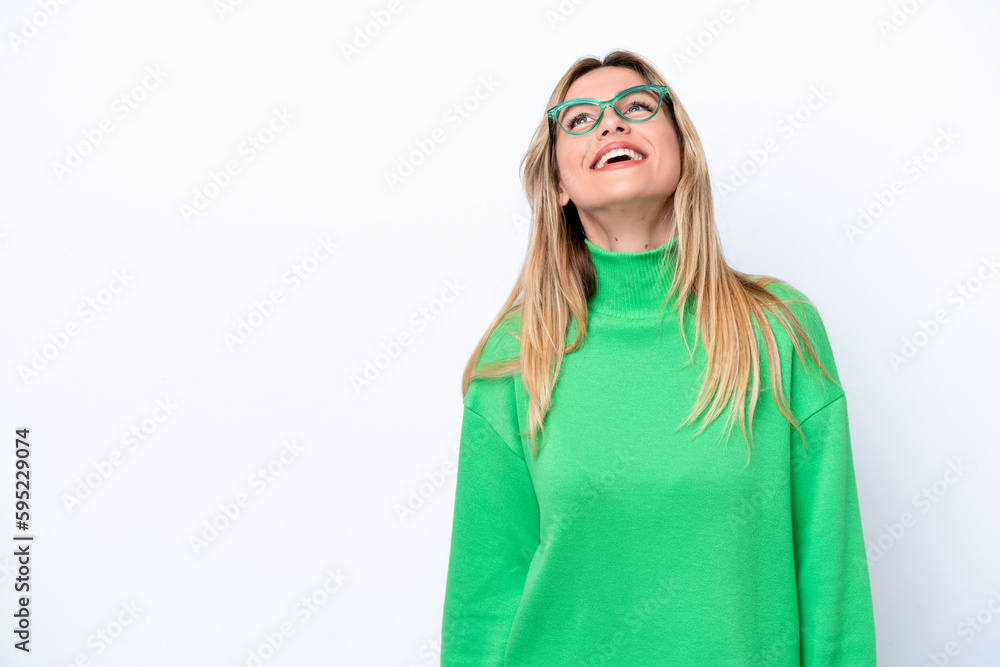 Young Uruguayan woman isolated on white background laughing