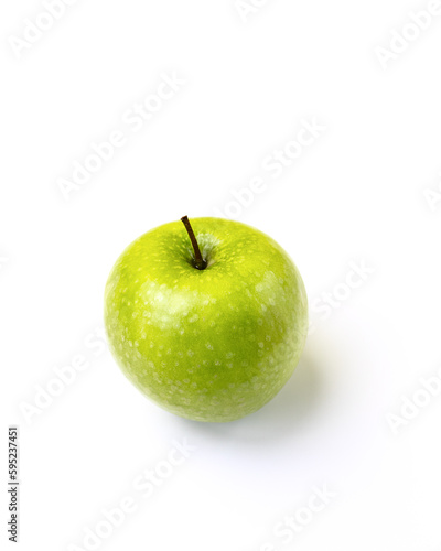A green apple with a white background. Isolate