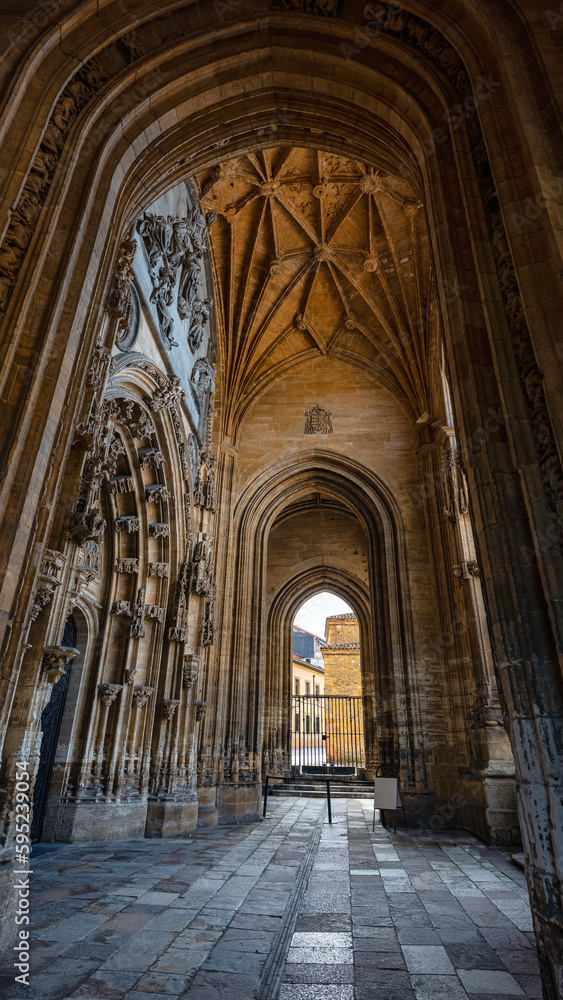 Access through the front facade to the monumental Gothic style cathedral of the city of Oviedo, Asturias.