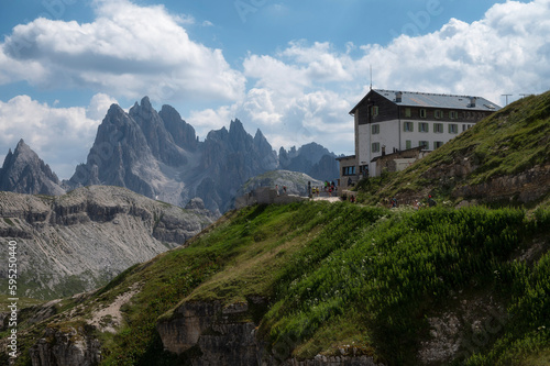 Mountain hut and Cadini di Misurina peak in Dolomite, Italy in Summer