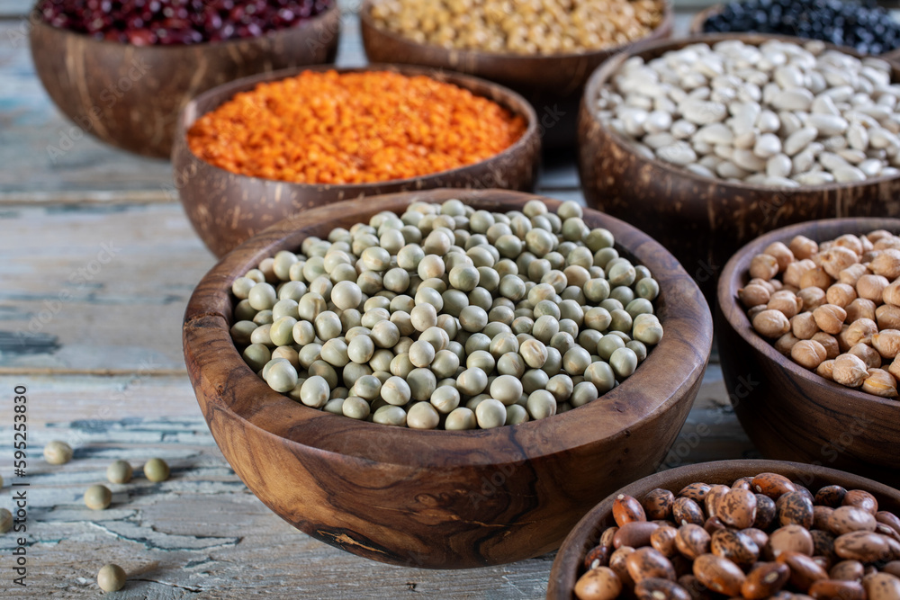 close up dried legumes green peas in wooden bowl close up dried legumes green peas in wooden bowl