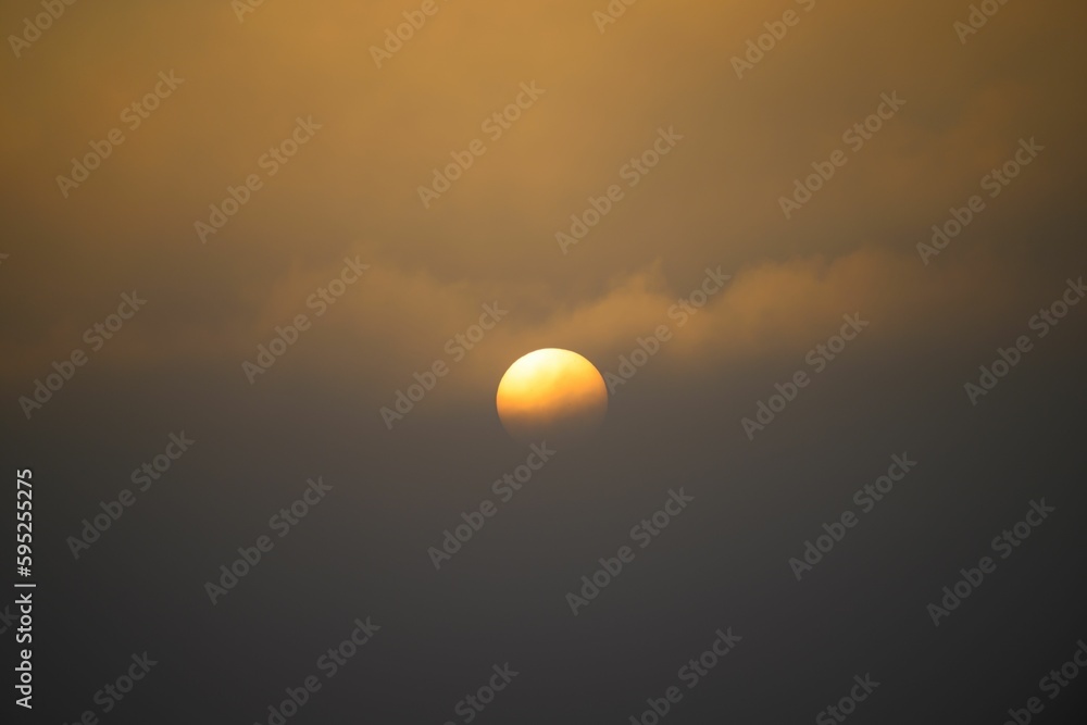 Stunning sunset sky with clouds.