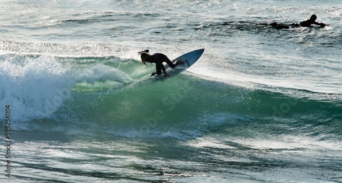 Photography Surfer battling the swell in the southwest of France