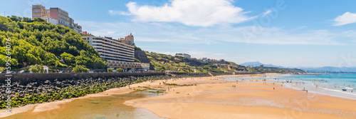 Coastline and sandy beach of the Cote des Basques in Biarritz, France on a summer day