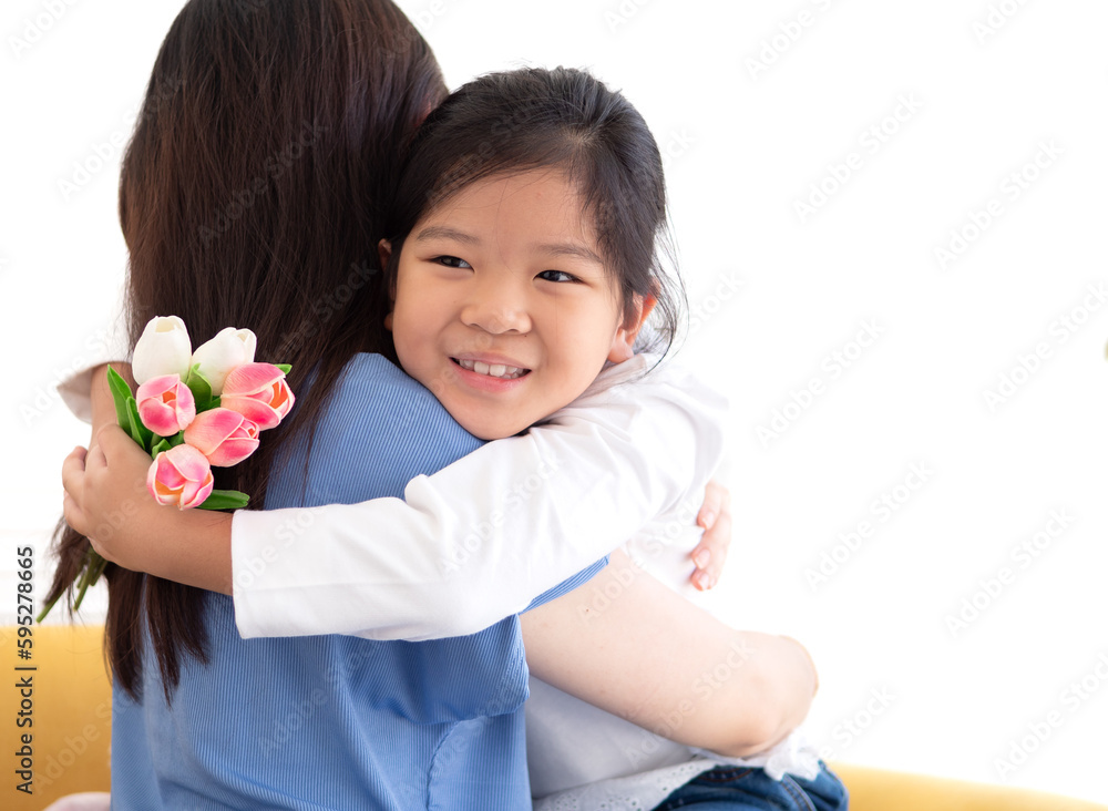 Cute little girl happy hug her mother. Portrait of Asian family ...