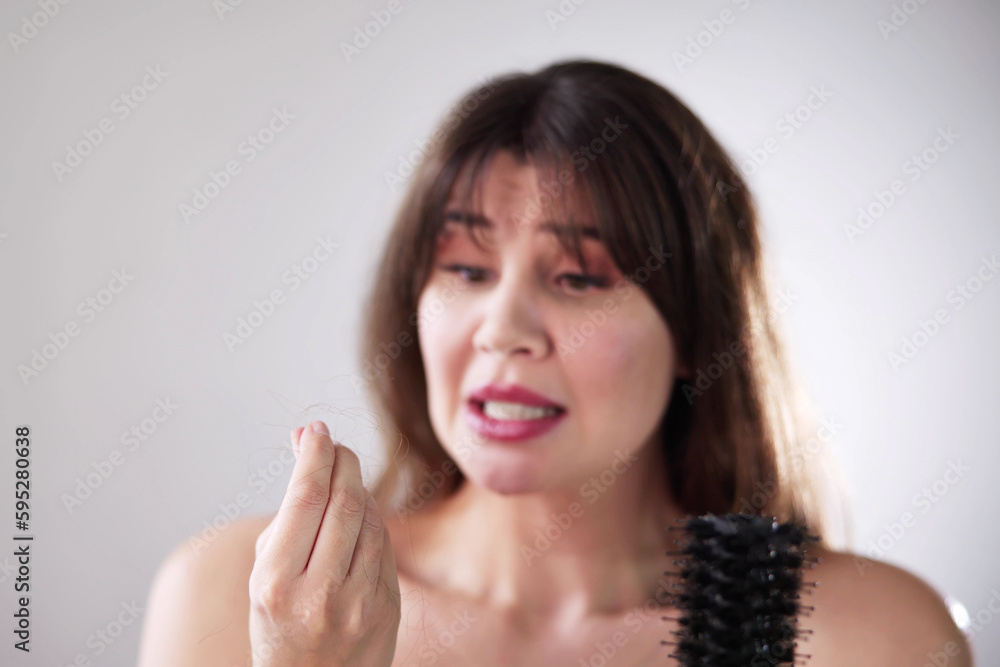 Hairfall And Hairloss. Worried Woman Hairfall And Hairloss. Worried Woman