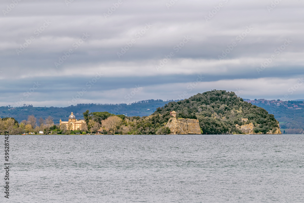 The Bisentina island of Lake Bolsena seen from Capodimonte, Italy