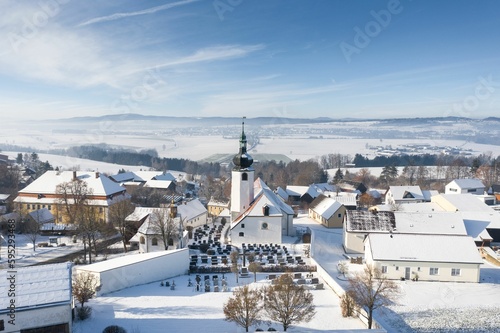 Aerial view of snow-covered Rooftops of a town in winter in Mitterteich