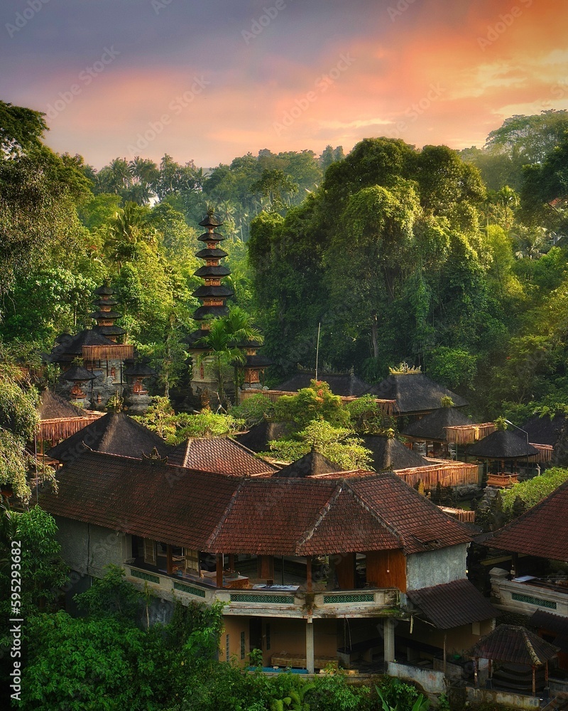 Vertical shot of a historic temple in Ubud during sunrise in Bali, Indonesia
