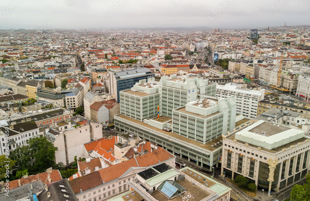 Aerial view of Vienna, Austria. Central streets and buildings from drone on a cloudy day