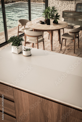 A stunning kitchen image featuring an elegant island countertop for product display  a green plant on the countertop  a beautiful dining table by the window overlooking a pool. 3d rendering