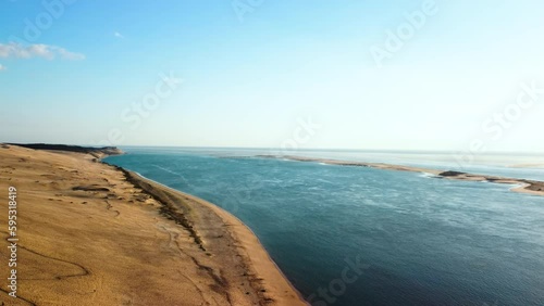 Aerial view Dune of Pilat, Dune du Pyla, the tallest sand dune in Europe, Arcachon Bay, Aquitaine, France. High quality 4k footage