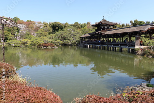 A scene of Seiho-ike Pond and Higashi-shin-en Japanese Garden in the precincts of Heian-jingu Shrine in Kyoto City in Japan 日本の京都市の平安神宮境内にある 東神苑と栖鳳池と泰平閣の風景