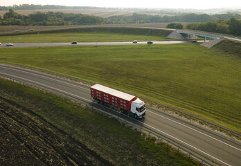 live animal transport truck move on road aeral view