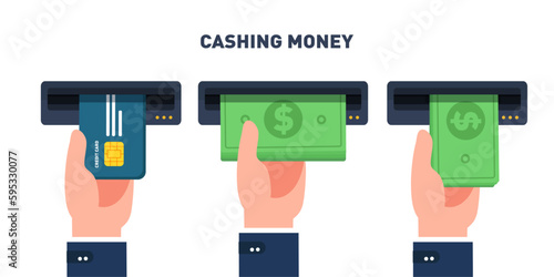 Businessman inserts a credit card or money into ATM and takes the money from the ATM. cashing in of money of the ATM