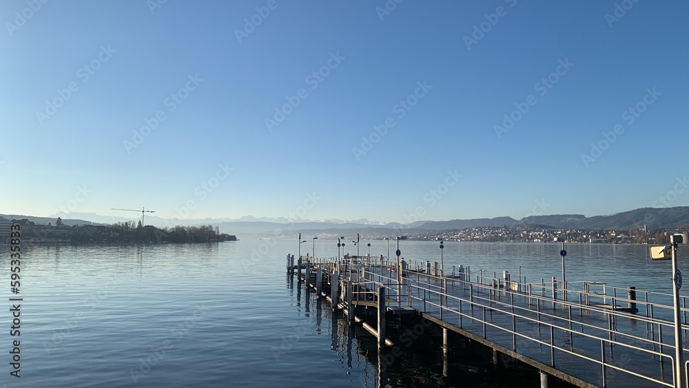 pier in the lake of Zurich on a sunny morning